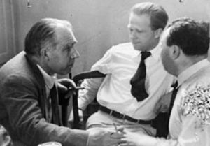 Bohr, Heis, and Puli chat in a circle